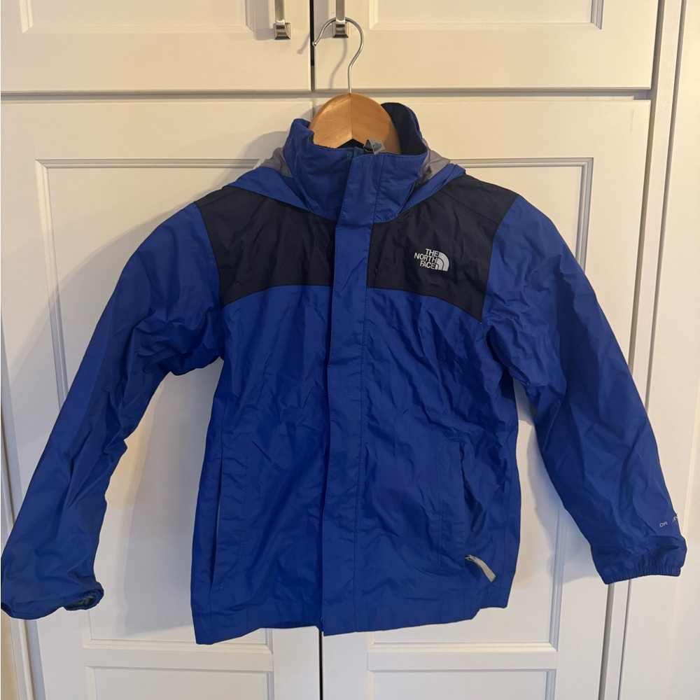 The North Face Boys Rain jacket. Size S (7/8)